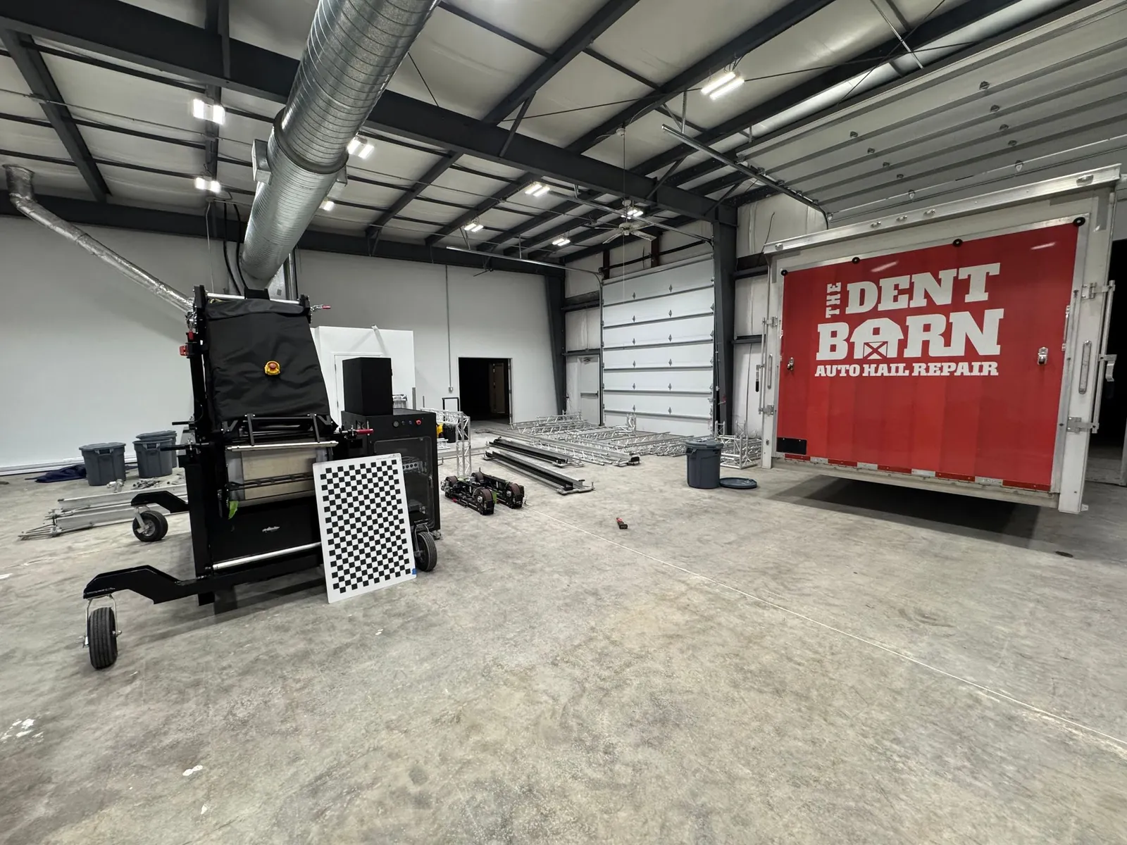 3D hail scanning equipment set up inside The Dent Barn shop
