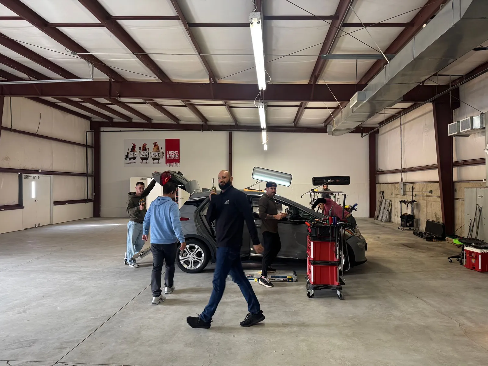 The Dent Barn team working on a vehicle in the Leavenworth shop